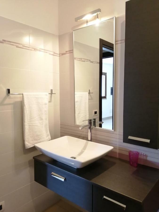 Casa Il Cortile Fiorito Apartment Tortoli Bagian luar foto